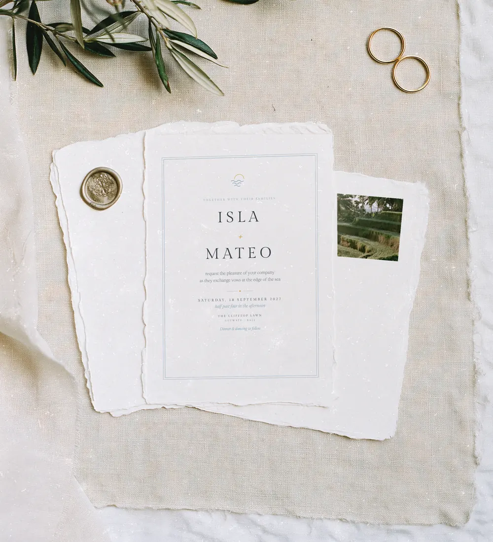 Bali wedding invitation suite on handmade deckle-edge paper with a wax seal