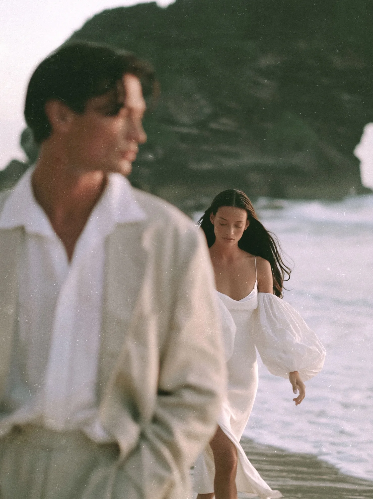 Bride and groom walking on a beach in Bali