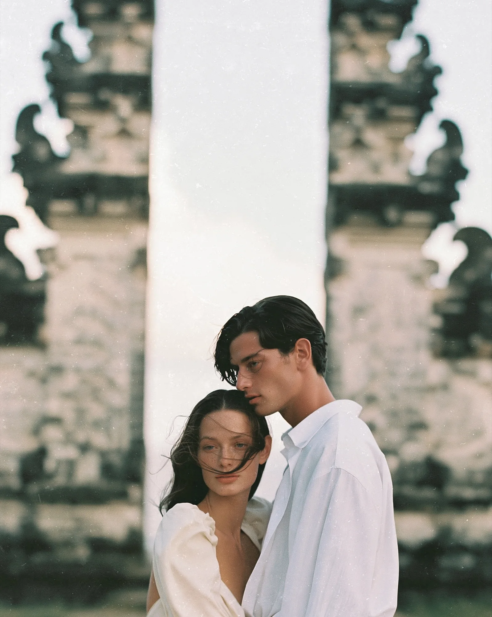 Couple at the Gates of Heaven temple in Bali