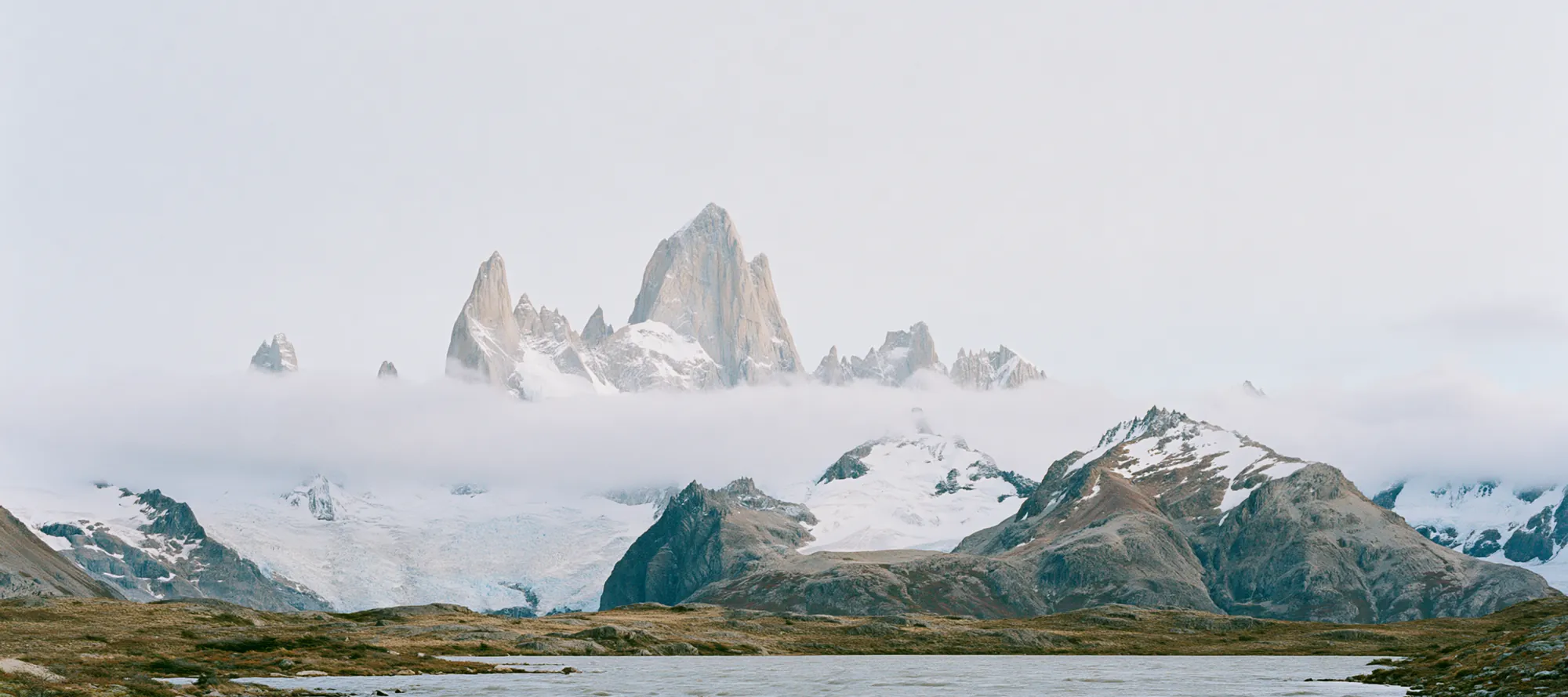 Fitz Roy and Cerro Torre peaks rising above the Patagonian steppe