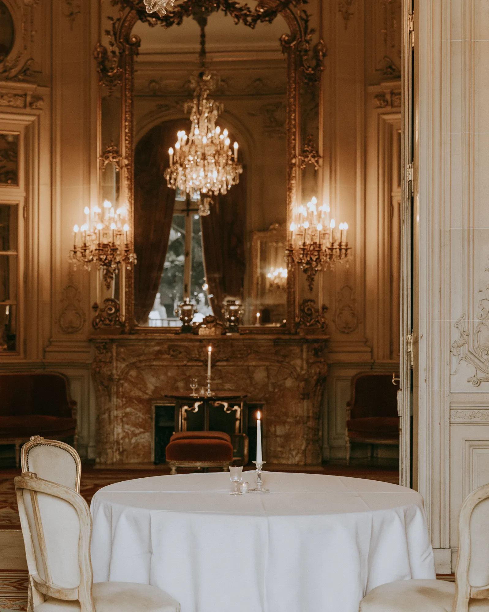 Gilded salon set with a reception table